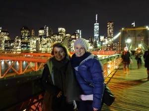 On the Brooklyn Bridge with the lights of Manhattan behind us. December, 2014